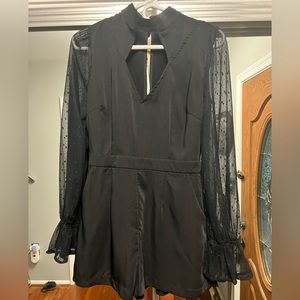 Women’s brand DO+BE black short romper. Long sleeve. Size small.